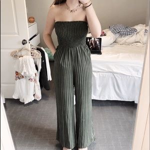 green jumpsuit